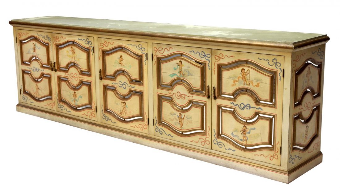 LONG PAINTED PARCHMENT TOP DECORATIVE SIDEBOARD: Long painted sideboard, Mexico, 20th c., rectangular with a parchment top, polychrome figural and foliate decoration with raised panels surrounded with mirror strips, five doors opening to the shelved
