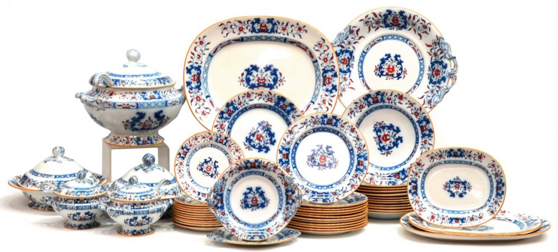 (59) VICTORIAN MINTON FLOW BLUE DINNER SERVICE: (lot of 59) Victorian Mintons flow blue dinner service, c. 1912-1950, blue and red flower and foliate design, comprising: (11) dinner plates, 10"diam; (12) shallow soup bowls, 10"diam; (12) lunch plat