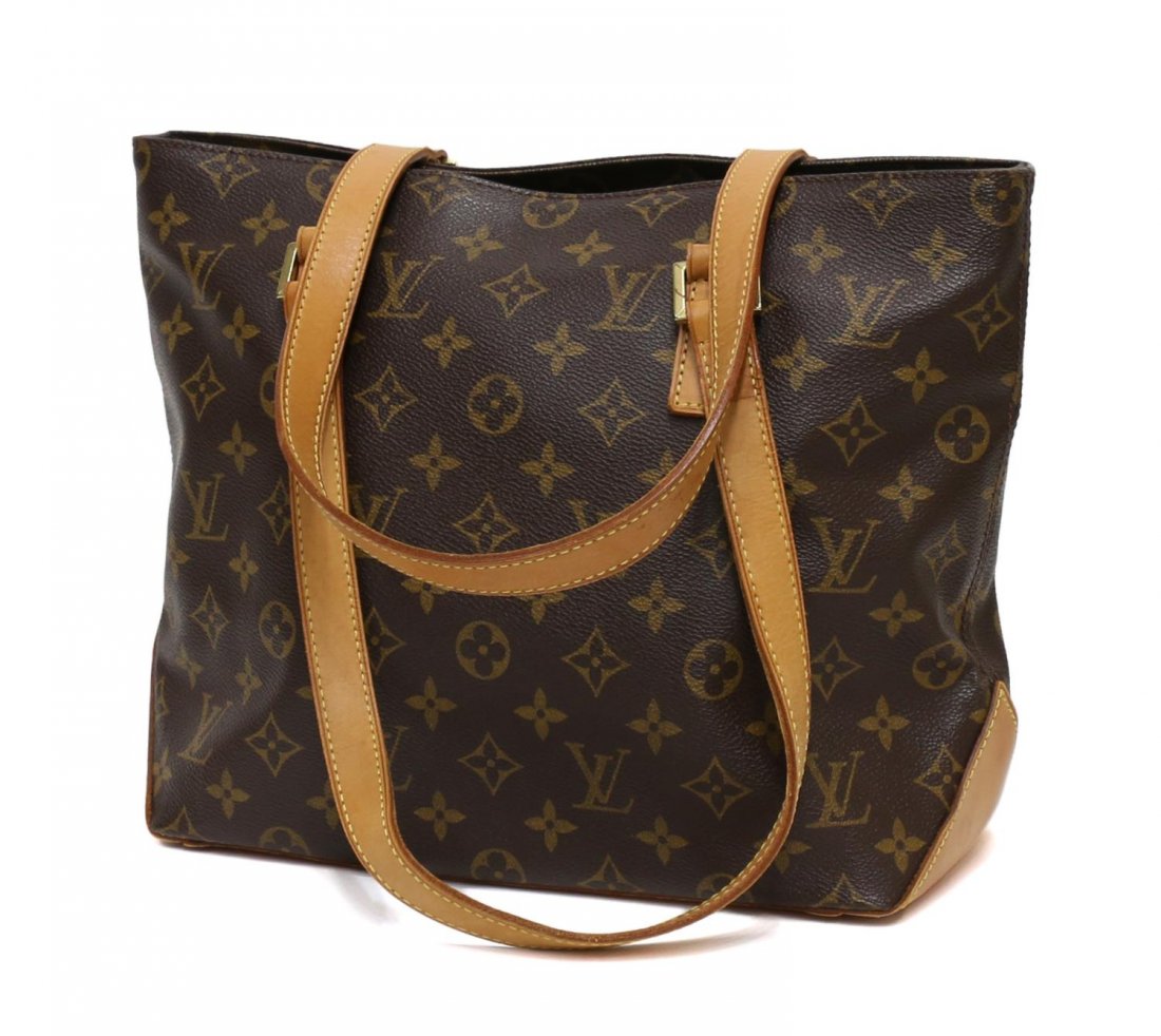 LOUIS VUITTON MONOGRAM CABAS PIANO TOTE BAG: Louis Vuitton monogram canvas "Cabas Piano" bag, interior cell and zipped pocket, leather straps and trim, leather bottom with some staining, leather handle with some cracking to leather as pictured, 