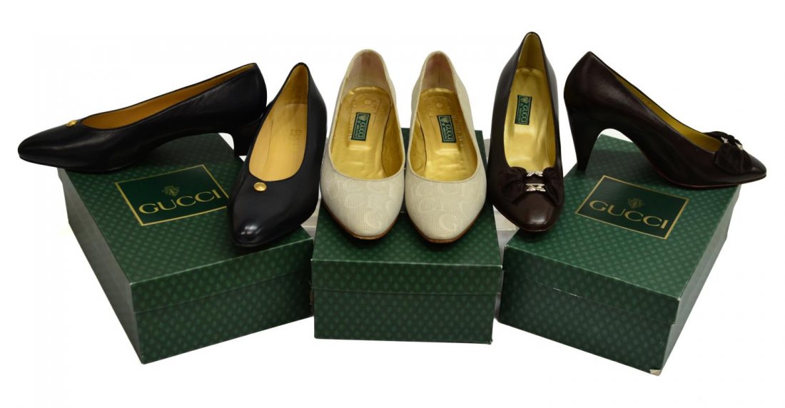 (3 PR) LADIES DESIGNER GUCCI LEATHER SHOES, BOXES: (lot of 3) Ladies Gucci shoes, two in new unworn condition,sizes as noted: (pair) low heels 'Gucci' on a textured ground, wear to bottom, size 38(pair) brown leather heels, new unworn condition, with 