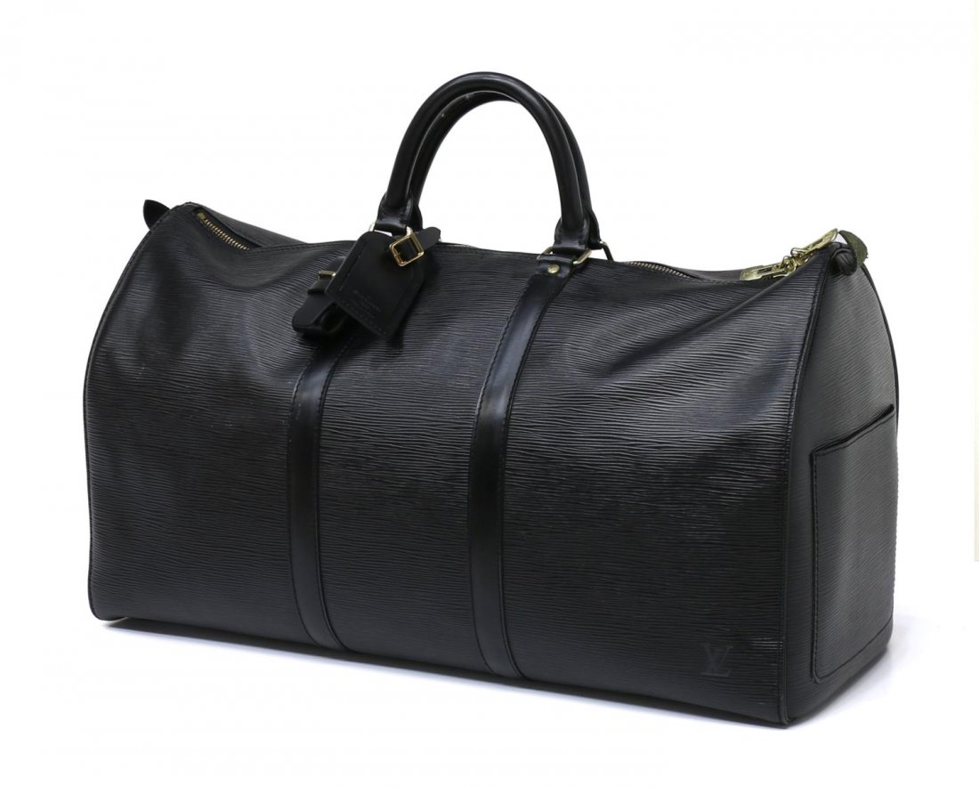 LOUIS VUITTON BLACK EPI LEATHER KEEPALL DUFFLE: Louis Vuitton black Epi leather "Keepall" duffle, gilt metal zipper, double handled with travel tag, exterior end pocket, retaining lock and two keys, very slight discoloration interior, including dus