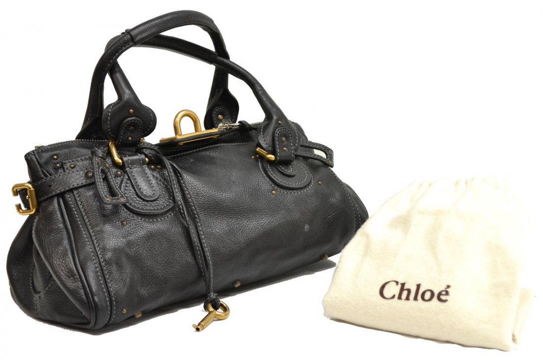 CHLOE BLACK LEATHER PADDINGTON MM PURSE: Chloe "Paddington MM" in black leather with brushed gold tone hardware, exterior slot pocket, cell and zipped pockets to interior, on small metal feet, accompanied by dust bag, lacking lock, bag: appr