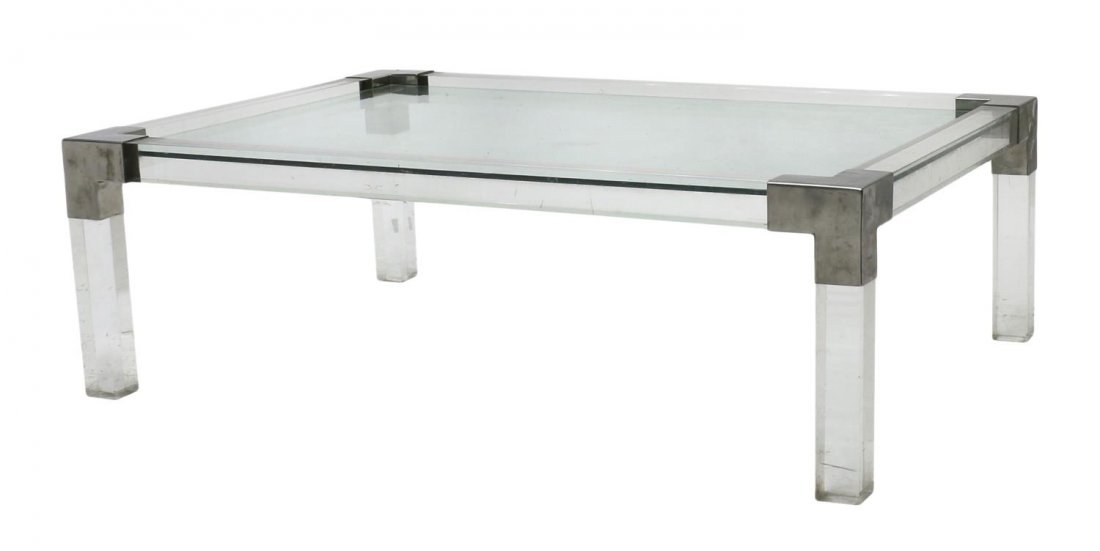 ITALIAN MODERN PLEXIGLASS COFFEE TABLE: Italian modern coffee table, 1970's, the inset glass top within a squared plexiglass frame joined at the corners and four squared legs by chromed plates, 16"h, 50"l, 34.25"d Start Price: $200.00