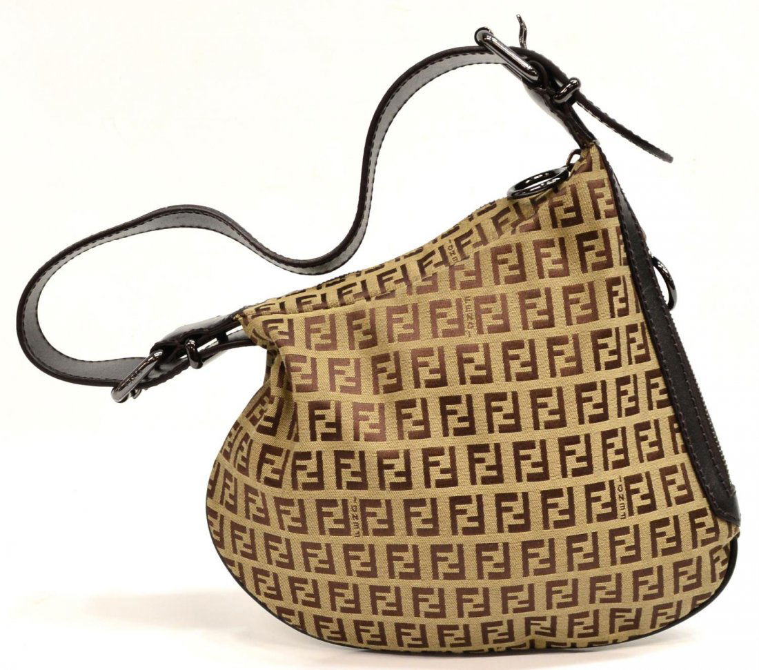 FENDI MONOGRAM CANVAS SIDE & TOP ZIP SHOULDER BAG: Fendi monogram canvas shoulder bag having silver tone metal hardware, top zip and size zip pockets, silver tone metal tag to interior, bag: approx 9"h, 10"w, .25lb Start Price: $60.00