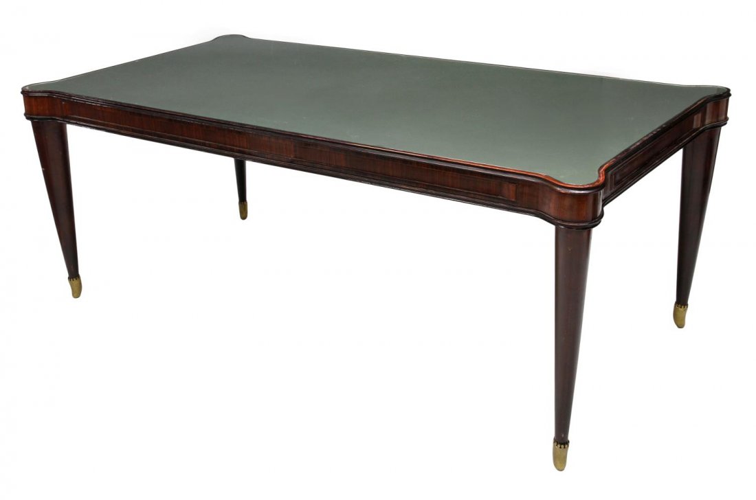 PAOLO BUFFA MID-CENTURY MODERN DINING TABLE: Mid-century modern rosewood framed dining table, 1940's design by Paolo Buffa (1903-1970), the rectangular glass inset top with protruding corners rising on tapered legs with brass shoe feet, 31"h, 79