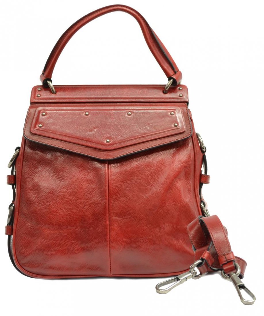 YVES SAINT-LAURENT RED LEATHER HANDBAG WITH STRAP: Yves Saint-Laurent handbag in red leather, accompanied by a shoulder strap, silver tone hardware, snap flap pocket concealing zipped and open storage on the lined interior, bag: approx 10.5"h, 10.5"w,