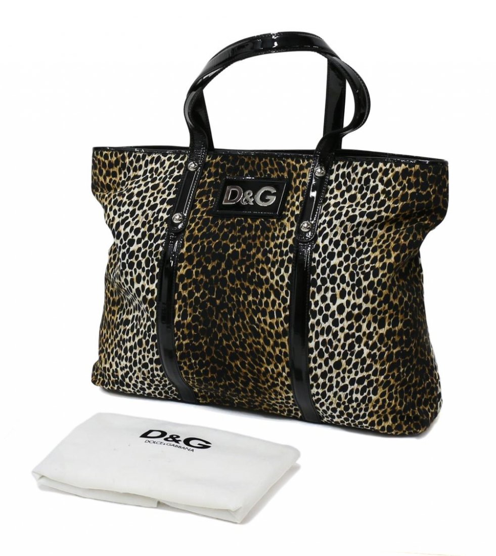 DOLCE & GABBANA ANIMAL PRINT & PATENT ESTELLE BAG: Dolce & Gabbana leopard print 'Bag Estelle' having black patent leather trim and handles, silver tone D & G logo on patent tag, lined interior with tag and single zip pocket, large white dust bag with