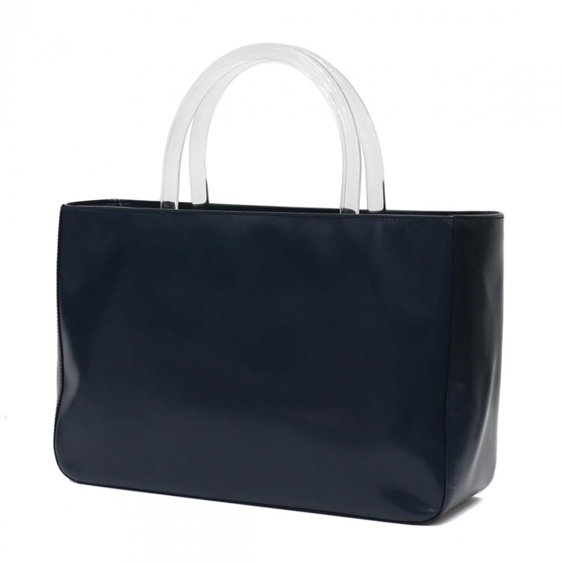PRADA NAVY BLUE LEATHER & LUCITE TOTE HANDBAG: Prada navy blue leather tote bag with lucite handles, logo lined interior with open and zipped sections, with white dust bag, bag: approx 8"h, 12"w, 1lb Start Price: $60.00
