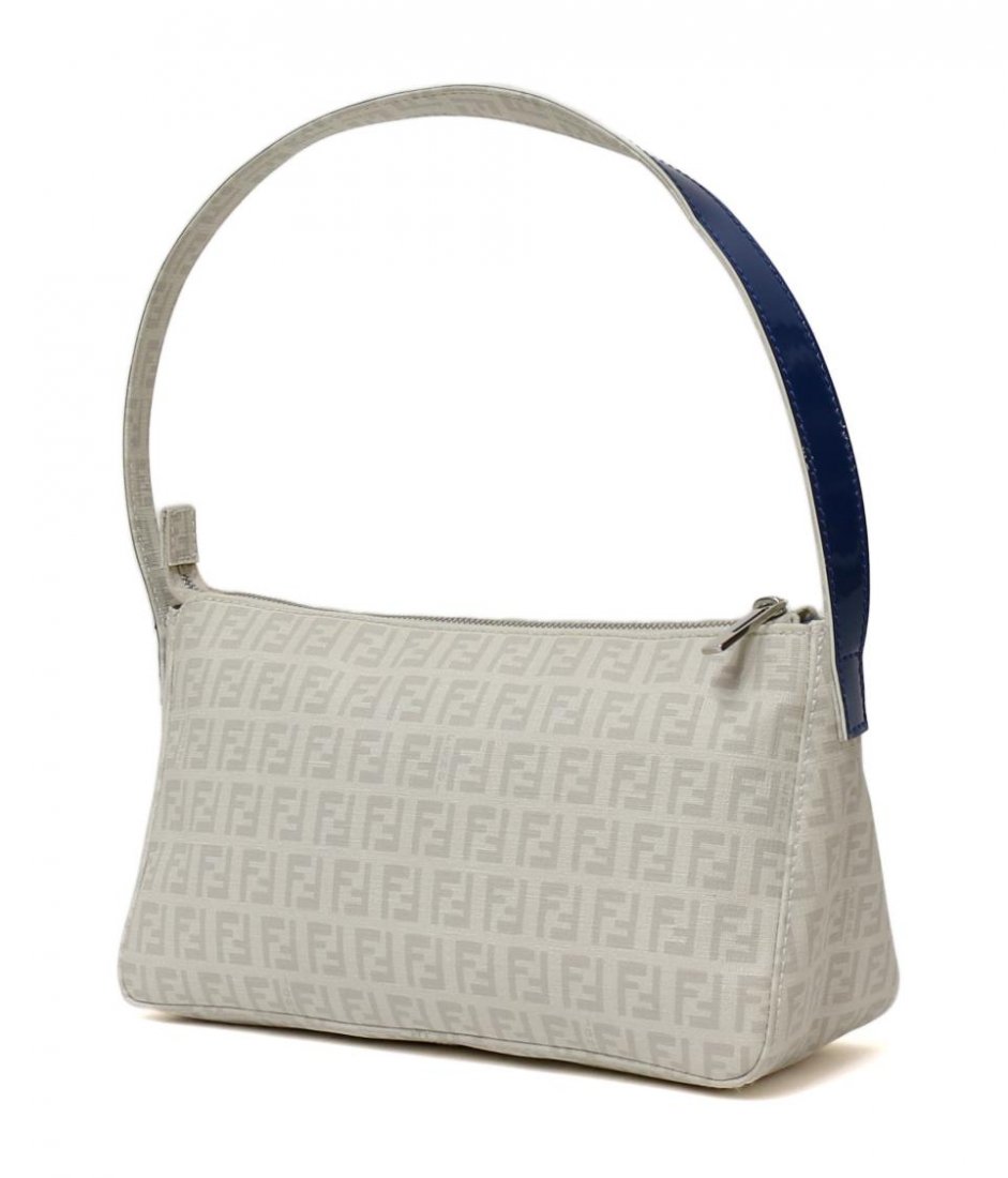 FENDI WHITE MONOGRAM CANVAS & BLUE PATENT PURSE: Fendi shoulder bag in white monogrammed canvas with blue patent leather strap, blue satin-like interior with small slot pocket, accompanied by a monogrammed luggage tag, white dust bag, small spot on