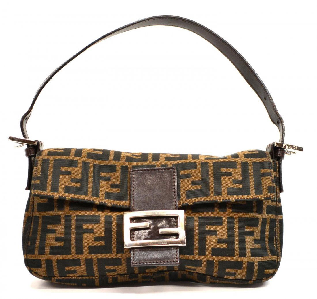 FENDI MONOGRAM CANVAS & LEATHER SHOULDER BAG: Fendi monogram canvas shoulder bag, brown leather strap and closure with silver tone metal logo, lined interior with single zip pocket, bag: approx 6.5"h, 11"w, .25lb Start Price: $100.00