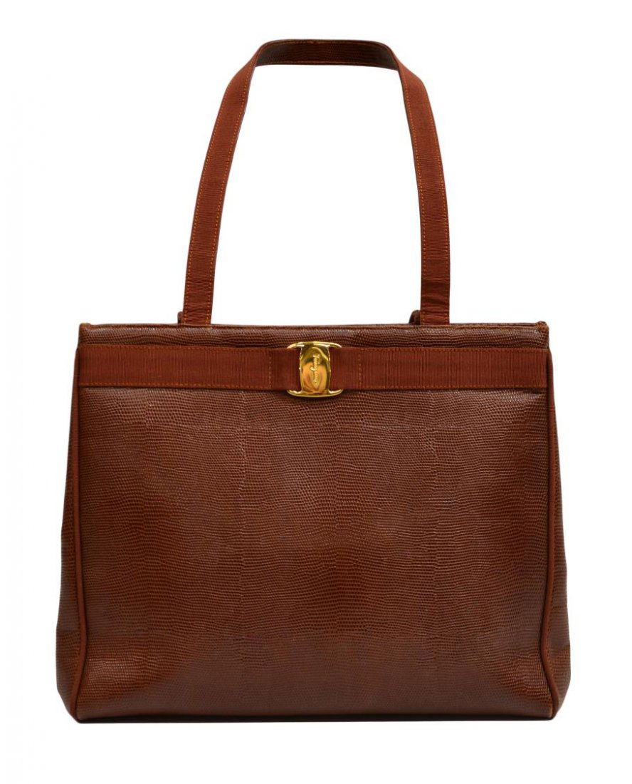 SALVATORE FERRAGAMO LIGHT BROWN LEATHER PURSE: Salvatore Ferragamo shoulder bag in light brown textured leather with gold tone hardware, light brown canvas trim and backing on handle straps, black fabric interior with one side zipper pocket cell,