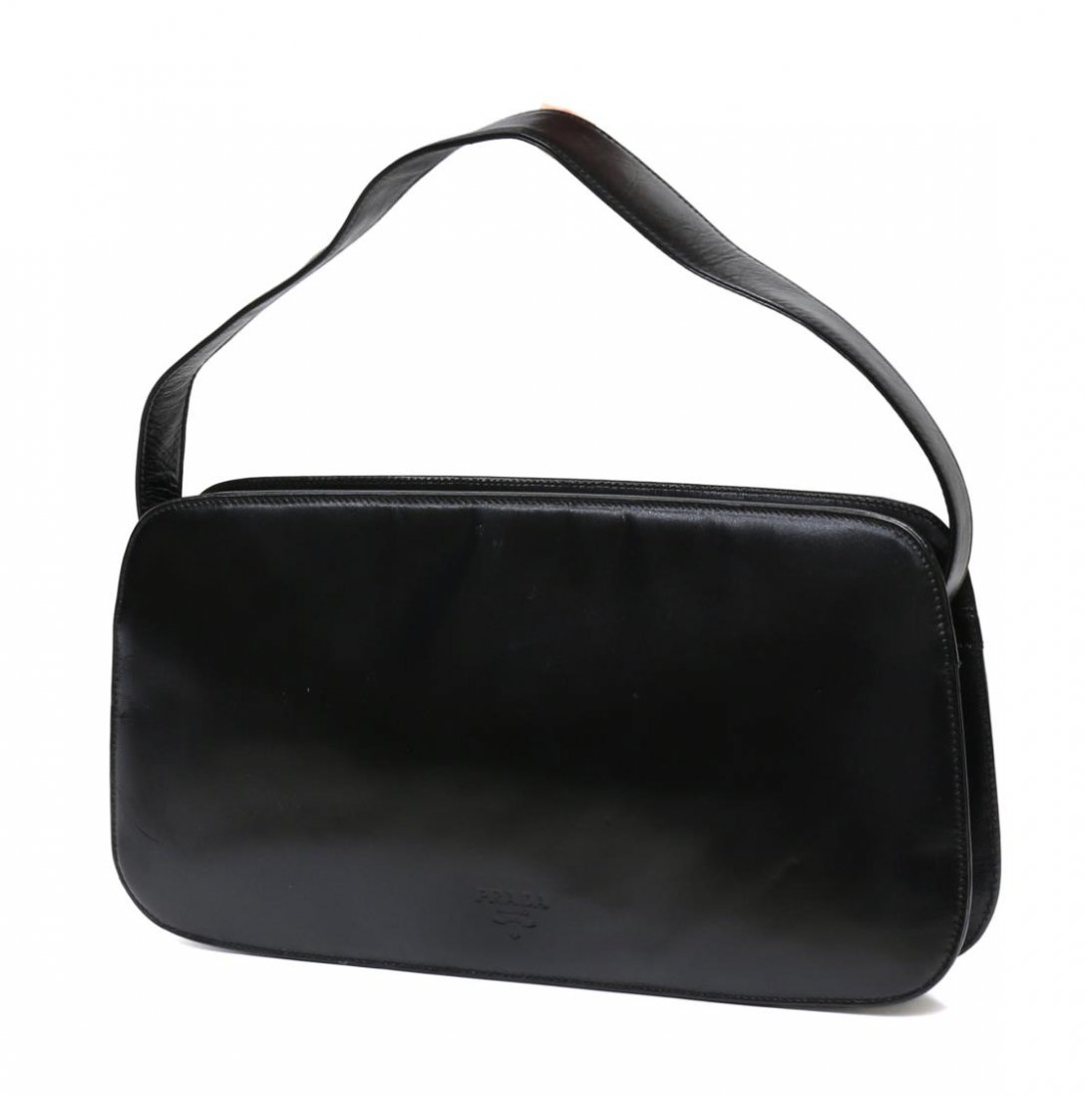 PRADA BLACK LEATHER LINED HANDBAG / PURSE: Prada black leather purse, log lined interior with single zip pocket, short shoulder strap, some indentions to leather, bag: approx 6.5"h, 12"w, Start Price: $50.00