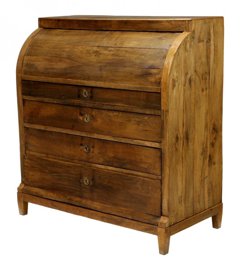 ANTIQUE BEIDERMEIR ELMWOOD BUREAU WITH DRAWERS: Biedermeier elmwood roll front bureau, mid 19th c., the cylinder roll opens to a drawer fitted gallery over the pull out writing surface with sliding door compartments, three lower exterior drawers, a