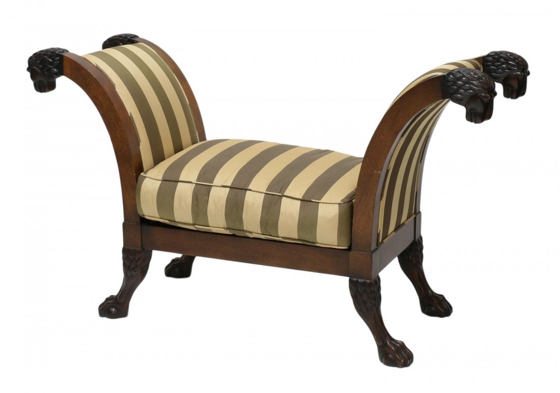 BAKER FURNITURE WINDOW SEAT, LIONS & CLAW FEET: Window seat by Baker Furniture Company, a mahogany finish with scrolled ebonized lions head arms, striped upholsery, rising on scrolled ebonized legs with claw feet, 32.5"h, 55.5"w, 20"d Start Price: 