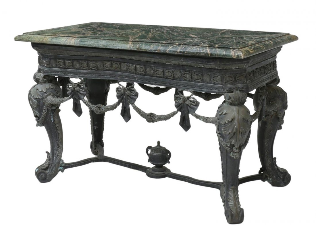 MARBLE & BRONZE ENTRY TABLE: Verde marble top table, the bronze base with accented frieze, large acanthus decorated legs joined by foliate garlands, a X stretcher with central vase form finial, rising on scrolled feet: 30"h, 48"w