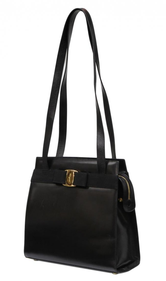 SALVATORE FERRAGAMO BLACK LEATHER SHOULDER BAG: Salvatore Ferragamo shoulder bag in black leather with gold tone hardware, canvas upper ribbon with bow, double long black leather straps, zipper closure, black interior with side zipper pocket, minor