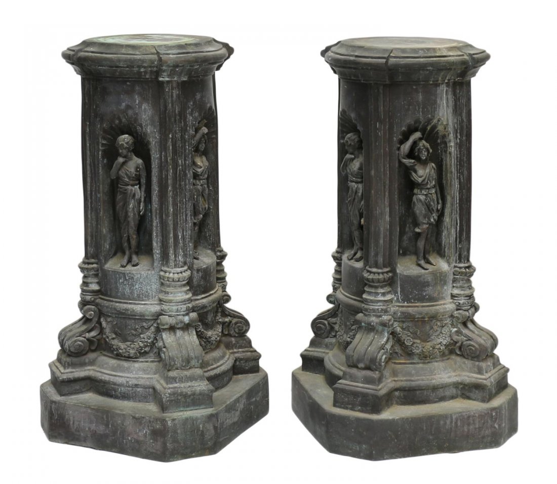 (2) BRONZE CLASSICAL MAIDEN GARDEN PEDESTALS: (pair) Large patinated bronze garden pedestals, each having a stepped top over four classically draped full-figured maidens standing within shell work archway enclosed by columns and scrolled corbels,