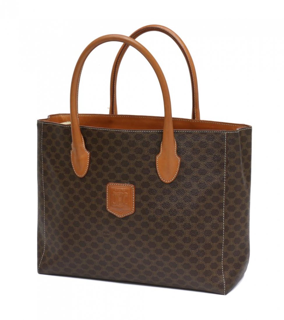 CELINE BROWN MONOGRAM CANVAS HANDLED BAG: Celine brown monogram canvas handbag, loop leather handles, sectioned interior with large central zippered pocket, zippered slot pocket to one side, bag: approx 9"h, 12"w Start Price: $80.00
