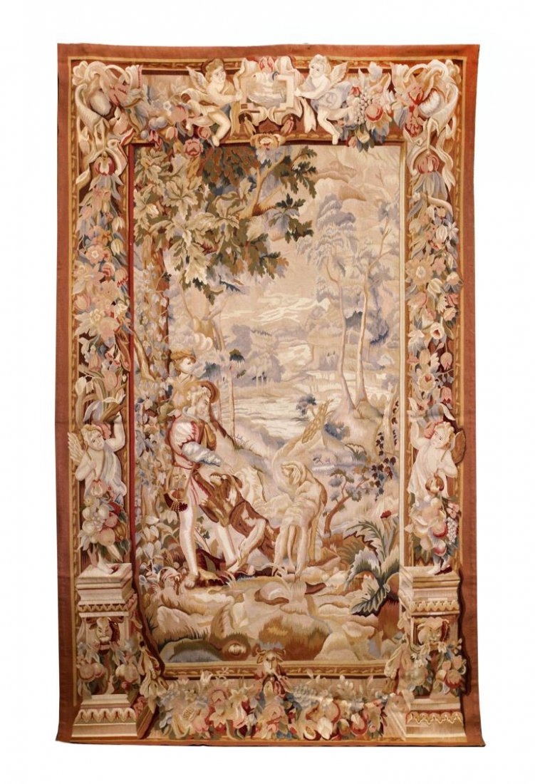 LARGE FIGURAL LANDSCAPE HANGING WALL TAPESTRY: Large hand woven hanging wall tapestry, late 20th c., figural scene of man with his two dogs and landscape in the back ground, border flanked by putti, approx 97"h, 58"w Start Price: $200.00
