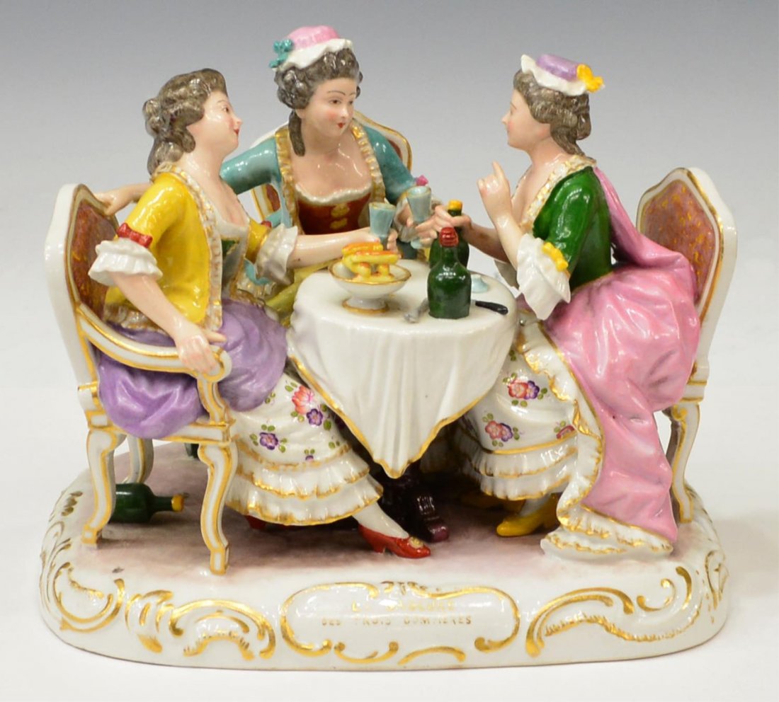 LARGE PORCELAIN FIGURAL GROUP, LA GAGEURE: A large porcelain figural group, 'La Gageure, Des Trois CommÃ¨res', three women at a dining table, crossed arrow mark as pictured, 7"h, 8.5"l, 6.25"w, 4lbs Start Price: $150.00