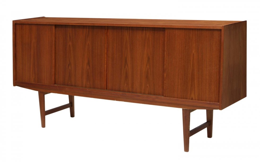 DANISH MID-CENTURY MODERN TEAKWOOD SIDEBOARD: Danish mid-century modern teakwood sideboard, c. 1960, rectangular with a four sliding door slant front opening to shelves and a mirror over a single drawer, rising on tapered legs, 37"h, 78.75"l, 18.