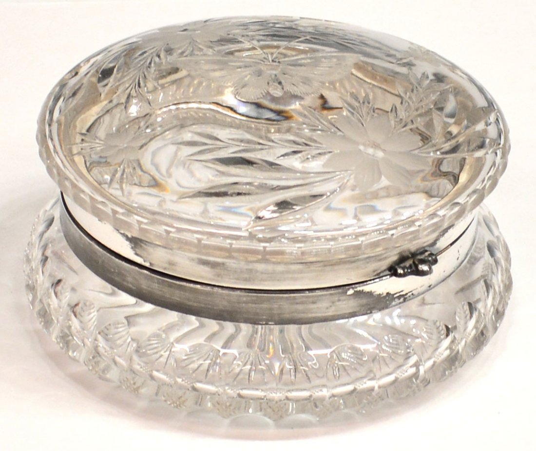 AMERICAN BUTTERFLY & FLOWER CUT GLASS DRESSER BOX: American cut glass dresser box, attributed to Pairpoint Mfg. Co., the hinged lid cut with a butterfly encircled by leafy flowers, silver plate collar numbered 55 on interior rim, the base cut with a b