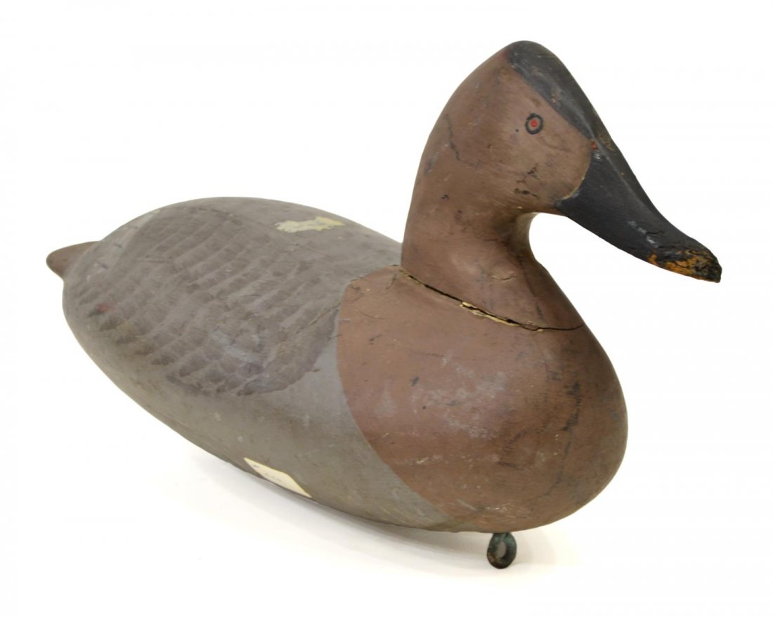 CANVASBACK DUCK DECOY ATTRIB. MADISON MITCHELL: Hand carved Canvasback duck decoy, attributed to Madison Mitchell (Maryland, 1901-1993), lead keel at underside, loss to beak, 8"h, 15.25"l, 6.25"w, 2.75lbs (252) Start Price: $60.00