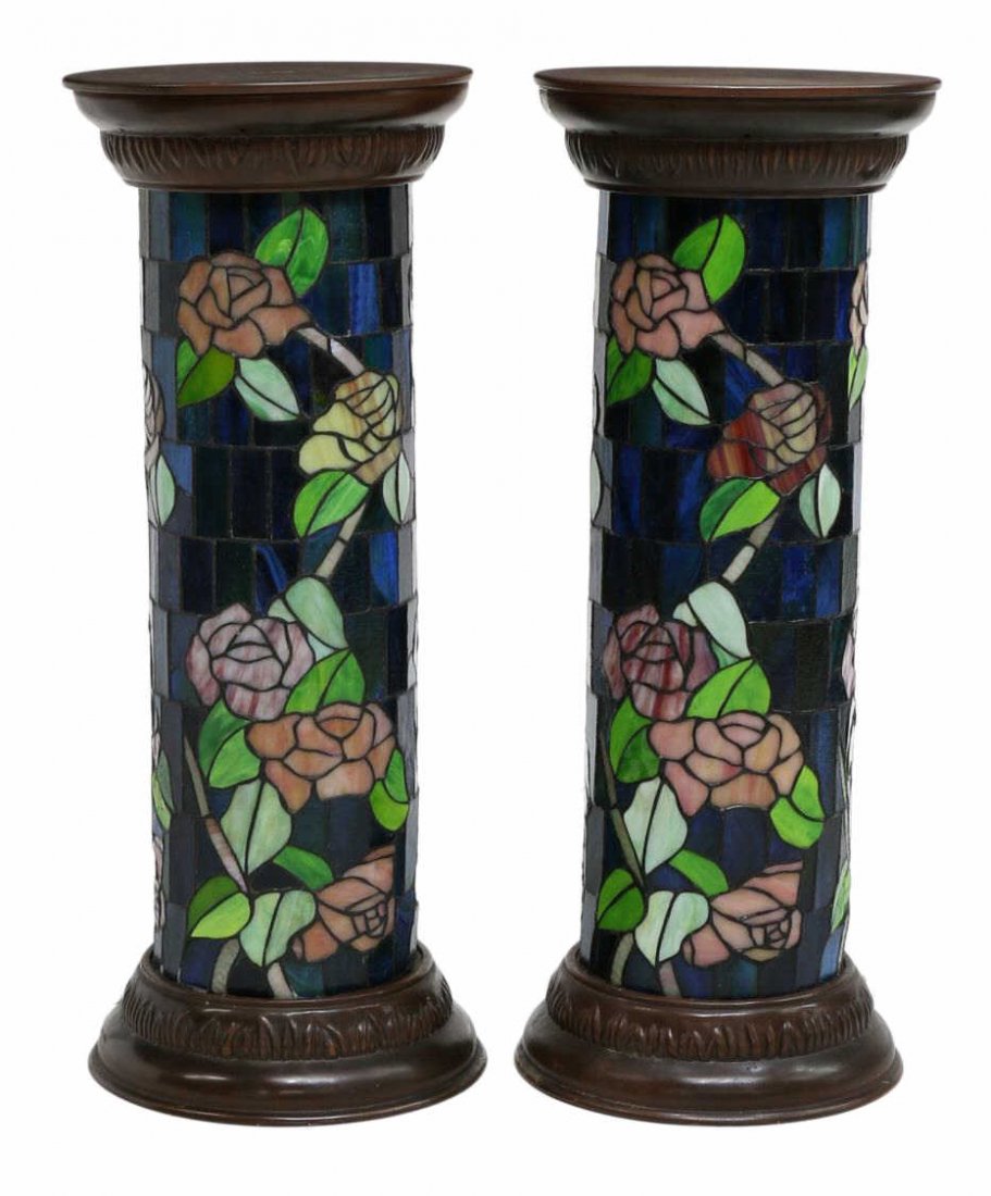 (2) LIGHTED STAINED GLASS PEDESTALS: (lot of 2) Stain glass pedestals, a circular top and base on the stained leaded glass column, the removable top provides access to the light, 31"h, 12.25"diameter Start Price: $150.00