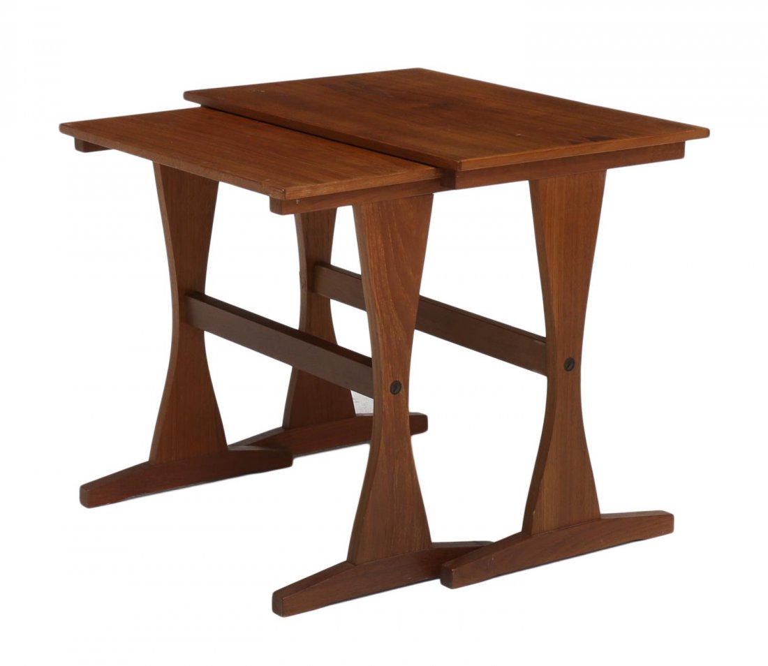 (2) DANISH MID-CENTURY MODERN NEST OF TABLES: (lot of 2) Danish mid-century modern nest of two teakwood rectangular top tables, shaped legs joined by stretchers, rising on trestle feet, largest: 18"h, 20.25"w, 13.5"d Start Price: $60.00