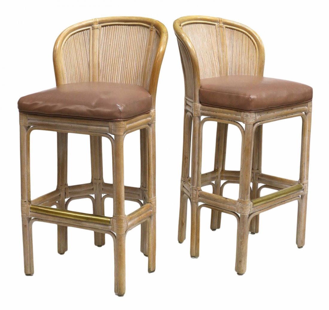 (2) SHELBY WILLIAM FAUX BAMBOO BAR STOOLS: (lot of 2) Faux bamboo bar stools, Shelby Williams Industries, the arched back over a mauve color seat cushions, a brass capped foot rail, rising on straight legs, 41.5"h, 18.75"w, 21"d Start Price: $