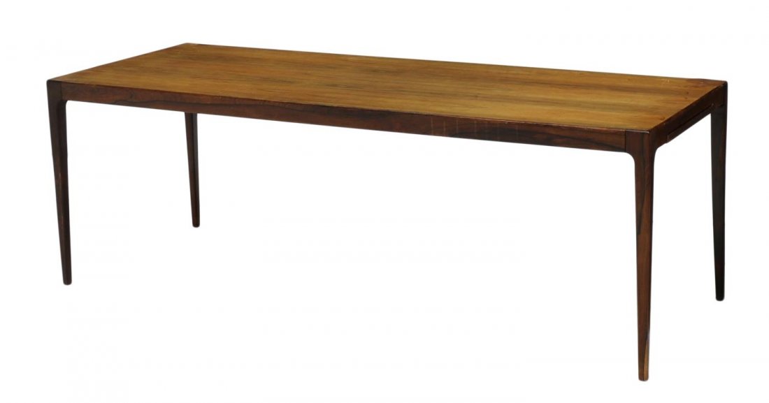 DANISH MID-CENTURY MODERN ROSEWOOD COFFEE TABLE: Danish mid-century modern rosewood coffee table, c. 1960, rectangular with a pull out tray at one end, rising on tapered squared legs, 20.25"h, 58.75"l, 22"d Start Price: $150.00