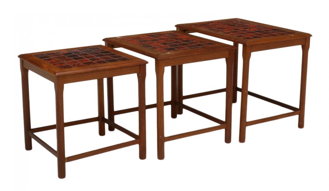 DANISH MID-CENTURY MODERN NEST OF TABLES: Danish mid-century modern teakwood nest of tables, 1950's, each with inset tile, all rising on stretcher joined octagonal legs, largest: 19.25"h, 22.75"w, 16.5"d Start Price: $80.00