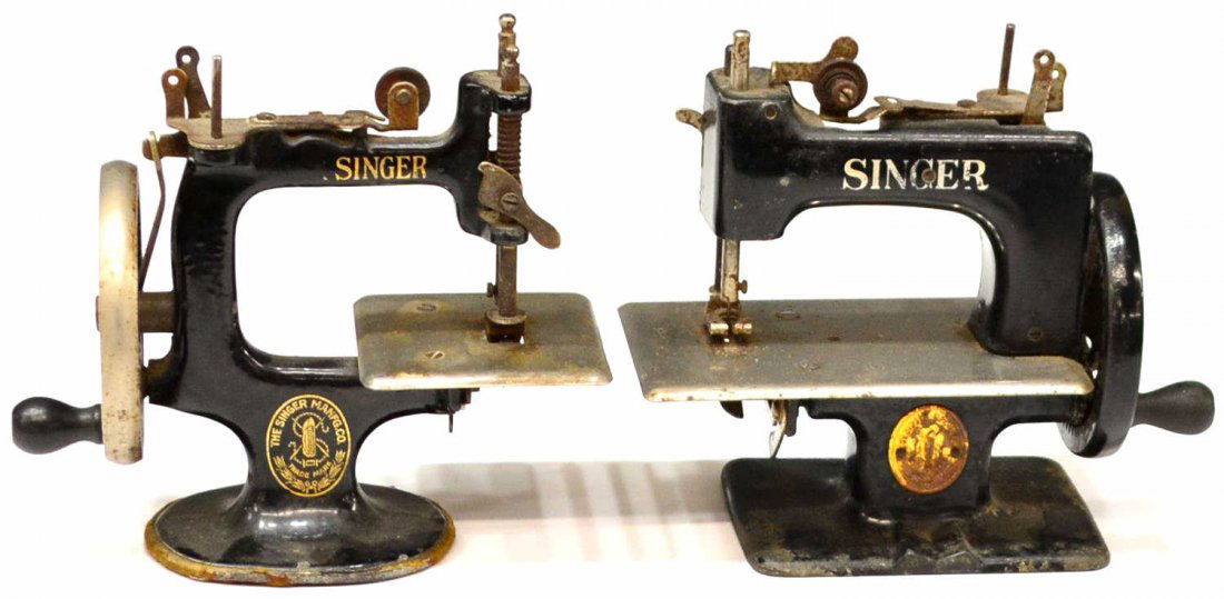 (2) SINGER ENAMELED CHILD'S TOY SEWING MACHINES: (lot of 2) Vintage Singer child's sewing machines, each in black enamel, overall some loss of finish, oxidation, 6.75"h, 7"w, 3.25"d, 4.5lbs total Start Price: $50.00