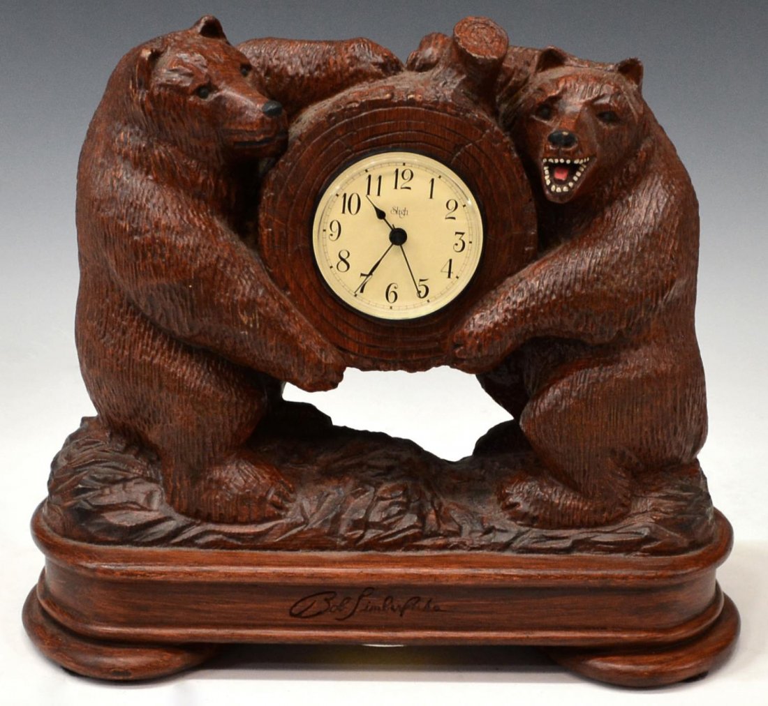 TWO BEAR SLIGH CLOCK, BOB TIMBERLAKE DESIGN: Sligh battery operated clock, design by artist Bob Timberlake, two bears holding a log centering the clock face, 9.75"h, 12"w, 5.25"d, 4.75lbs Start Price: $40.00