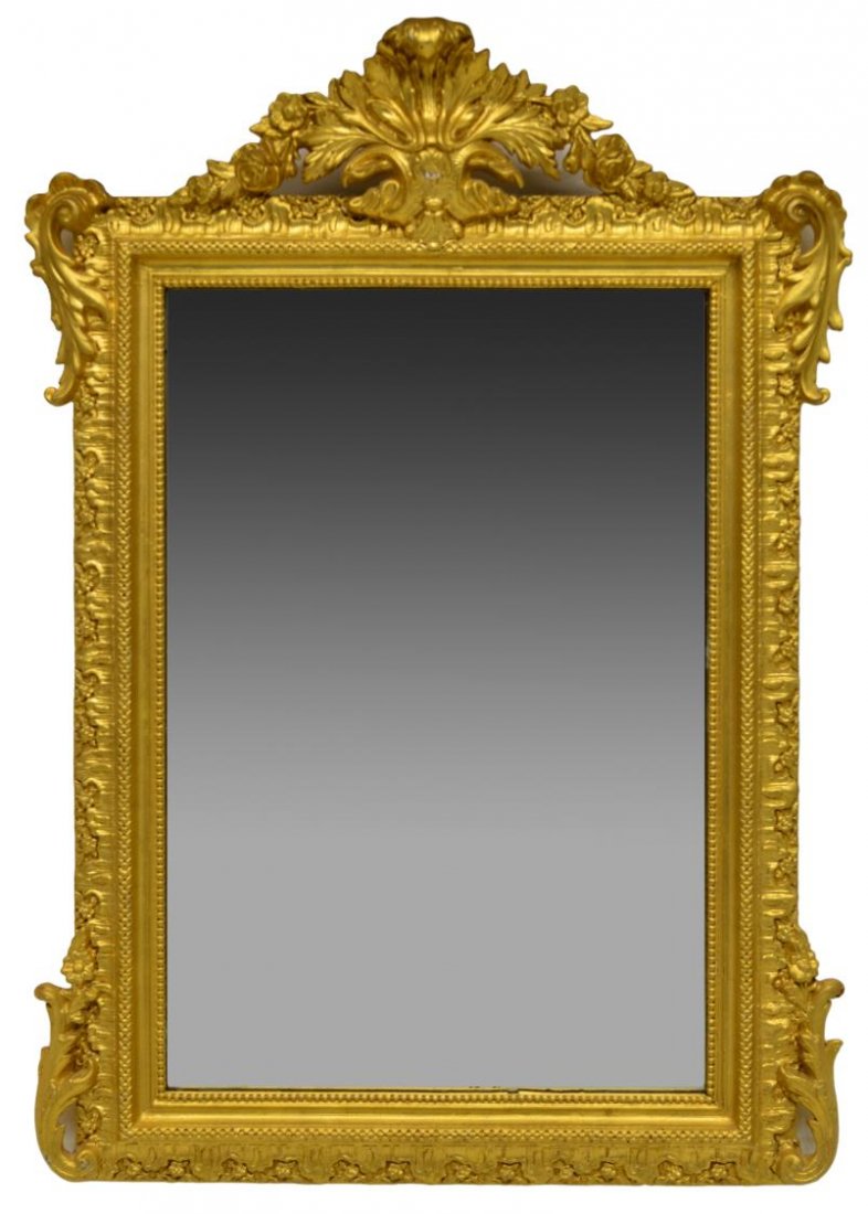 FRENCH GILTWOOD PIERCED FRAME MIRROR: French giltwood pierced framed mirror, c. 1900, a protruding cornice with pierced foliate corners, 46.75"h, 33"w Start Price: $150.00