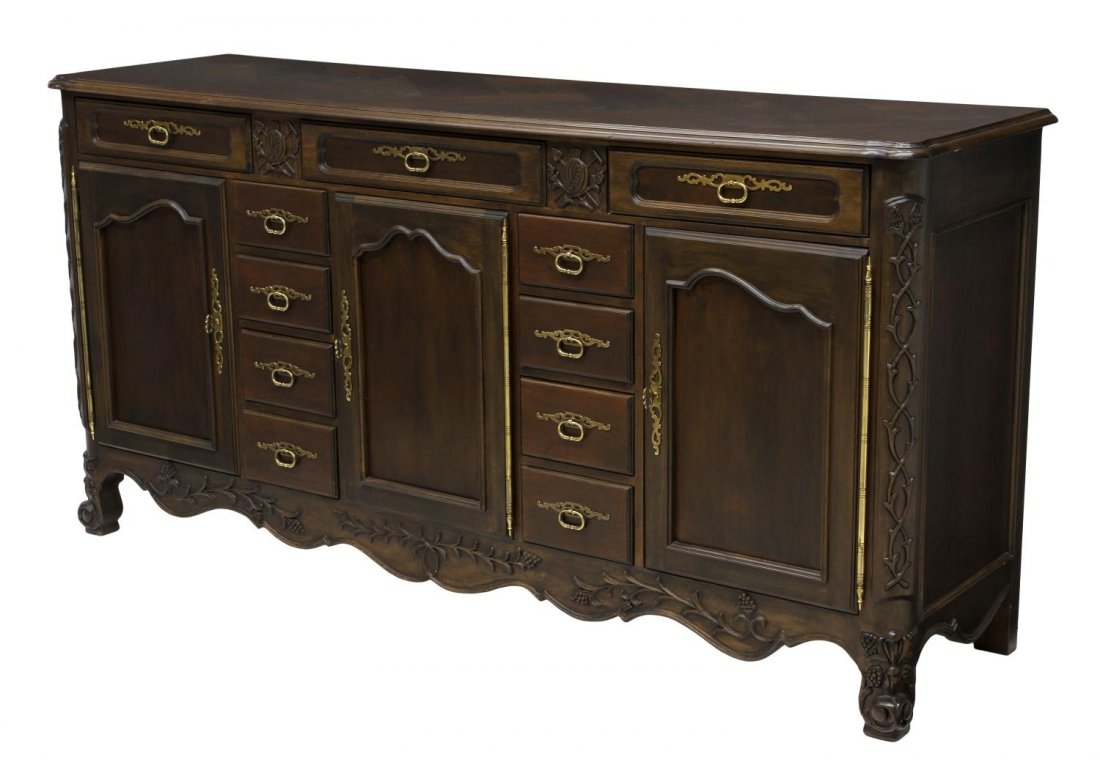 FANCY MT. AIRY LOUIS XV STYLE SIDEBOARD: Louis XV style dark wood finish sideboard, Mt. Airy Furniture Company, N.C., decorated with applied foliate carving and exposed long brass door hinges, three frieze drawers over three two banks of fou
