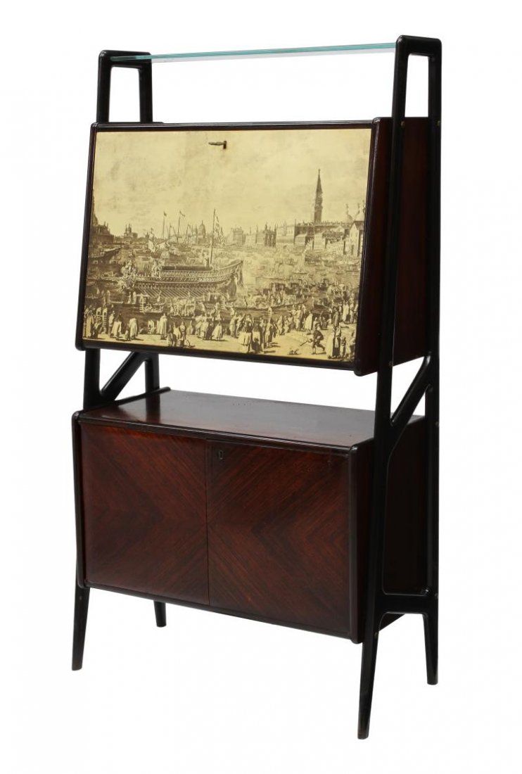 ITALIAN MID-CENTURY MODERN ROSEWOOD BAR CABINET: Italian mid-century modern rosewood bar cabinet, 1960's, design in the manner Ico Parisi (Italian, 1916-1996), the angular sides framing an upper glass shelf over the central drop front door faced wit
