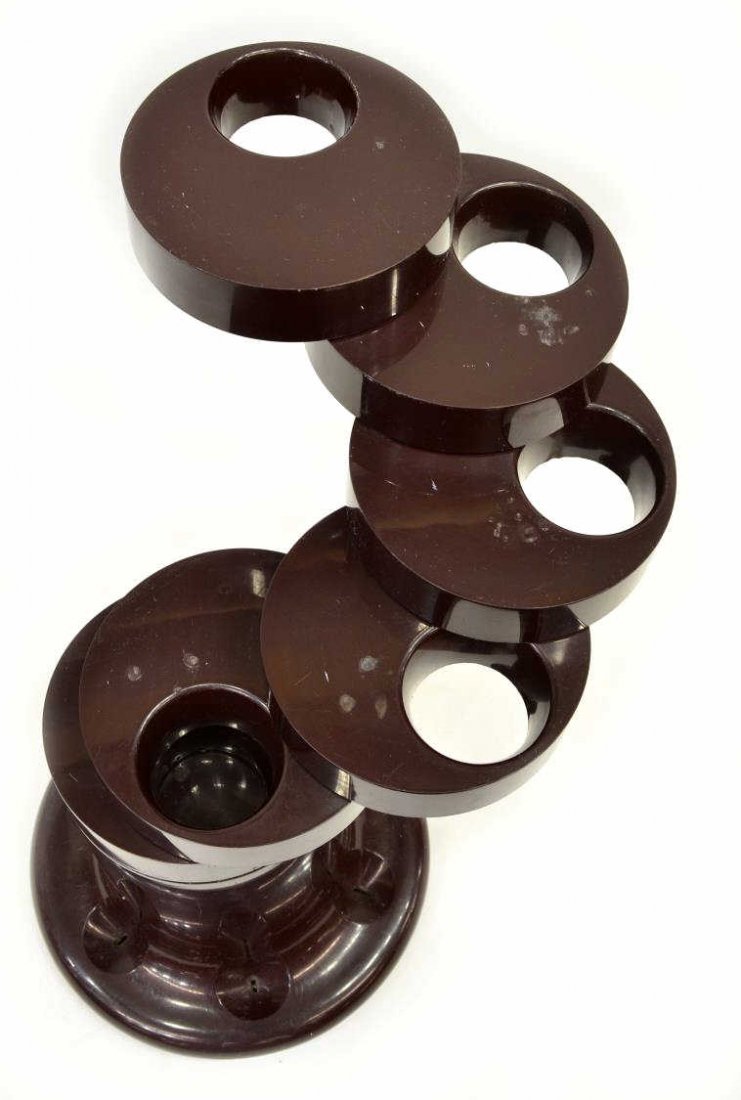 ITALIAN MODERN PIRETTI FOR CASTELLI UMBRELLA STAND: Italian modern plastic umbrella stand, c. 1970, Model Pluvium design by Giancarlo Piretti for Anonima Castelli, G.C. Piretti (Italian , b. 1940), brown tubular standard with adjustable disc having cir