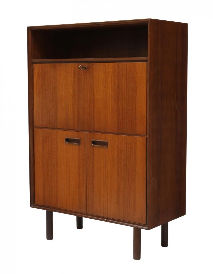 ITALIAN MID-CENTURY MODERN TEAKWOOD CABINET: Italian mid-century modern teakwood cabinet, 1960's the rectangular top above an open shelf, a central drop front opening to storage and writing surface, two lower doors, all raised on turned legs, 53