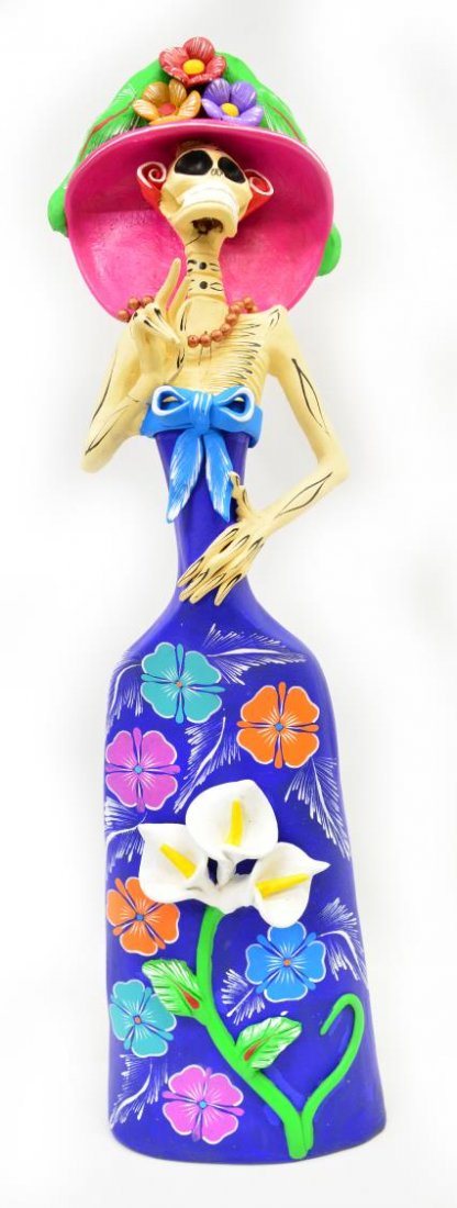 ALFONSO SOTENO F, DIA DE LOS MUERTOS, METEPEC, MX: Folk art pottery figure, Dia De Los Muertos, signed Alfonso Soteno F (Jose Alfonso Soteno Fernandez, Metepec, Mexico), vibrant polychrome gown and floral decorated hat, restoration to neck and wrist, 