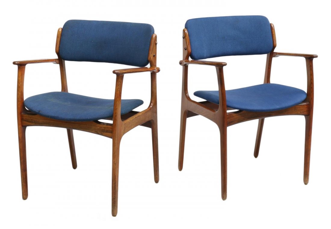 (2) ERIK BUCH DANISH MID-CENTURY ARM CHAIRS: (lot of 2) Danish mid-century modern rosewood armchairs, design by Erik Buch (Danish, 1923-1972), curved royal blue upholstered back and seat between flat shaped arms, rising on tapering legs, foil la