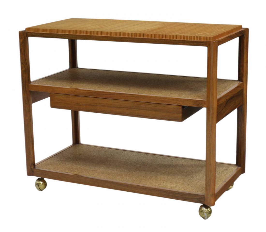 WORMLEY DUNBAR TEA OR SEVICE CART: Dunbar service, tea or bar cart, design by Edward Wormley (American, 1907-1995), a rosewood frame with rectangular striped mahogany top, two lower tiers inset with cork, a single central drawer with t