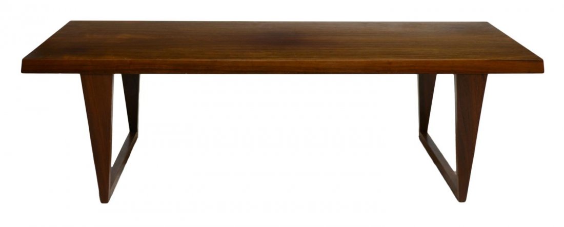 DANISH MID-CENTURY MODERN COFFEE TABLE: Danish mid-century modern wood coffee table, rectangular top rising on stretcher joined triangular tapering legs, approx 20"h, 65.5"w, 23.25"d Start Price: $200.00