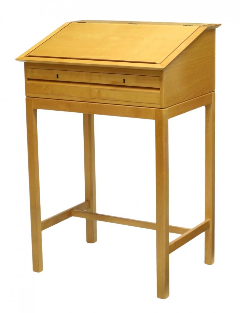 DANISH MODERN BIRCH STANDUP WRITING DESK: Danish modern birch standup writing desk, 1970's, the slant top opens to storage, two lower lockable doors, all rising on stretcher joined square legs, 47.5"h, 31.25"w, 23.5"d *Provenance: Estate of W