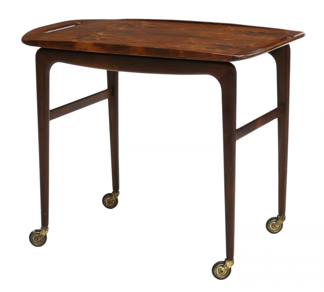 DANISH MODERN ROSEWOOD SERVICE CART: Danish modern rosewood service or tea cart, having a removable serving tray top, stretcher joined tapered legs on castors, 22.75"h, 27.5"w, 17.75"d *Provenance: Estate of Walter Hamilton White (Texas,
