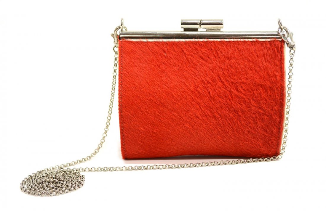 BVLGARI RED PONY HAIR & SILVER TONE CHAIN PURSE: Bvlgari coin / mini purse in red pony hair, silver tone hardware, kiss lock opening to lined interior, detachable chain crossbody strap, bag: approx 4"h, 4.75"w, .25lb total Start Price: $100.00