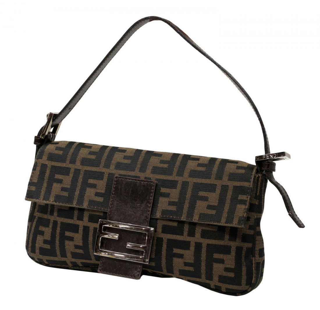 FENDI BROWN ZUCCA MONOGRAM BAGUETTE PURSE: Fendi "Baguette" shoulder bag in brown zucca monogrammed canvas, brown leather accents, silver tone hardware, magnetic snap opening to dark brown lined interior with zip side pocket, adjustable should