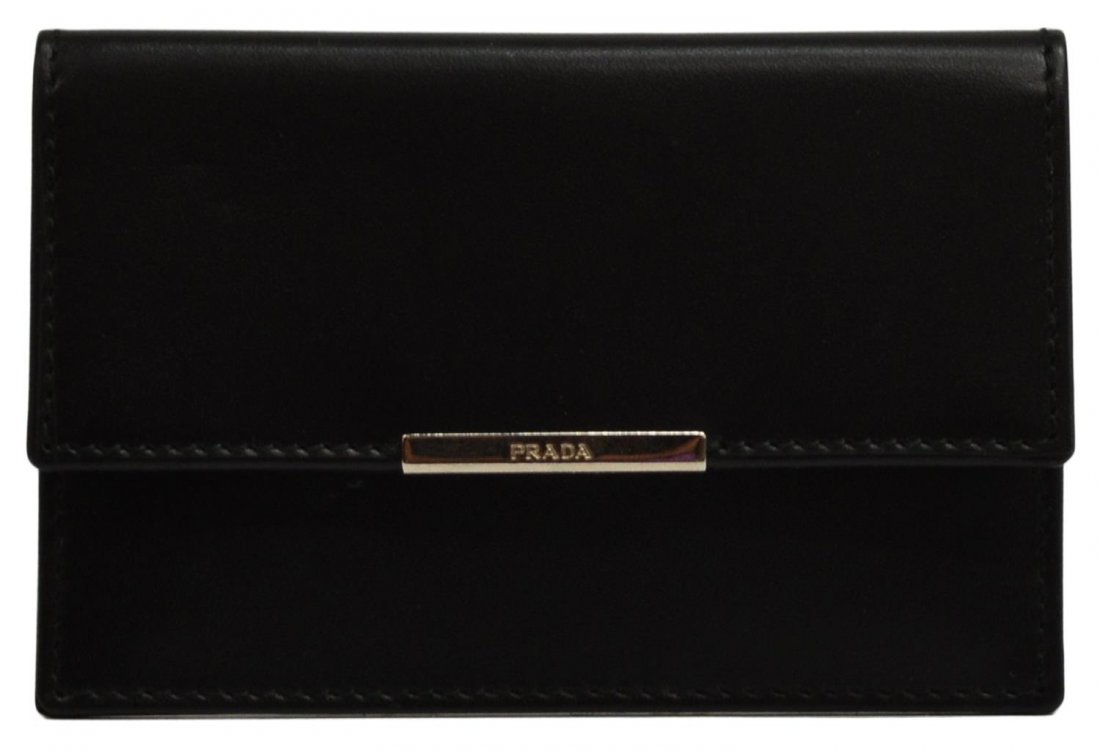 GENTS PRADA BLACK LEATHER & SILVER TONE CARD CASE: Prada Milano card holder in black leather, silver tone hardware, snap clasp closure opening fold to two card slots, accompanied by certification of authenticity card, very few tiny scuffs to leather,