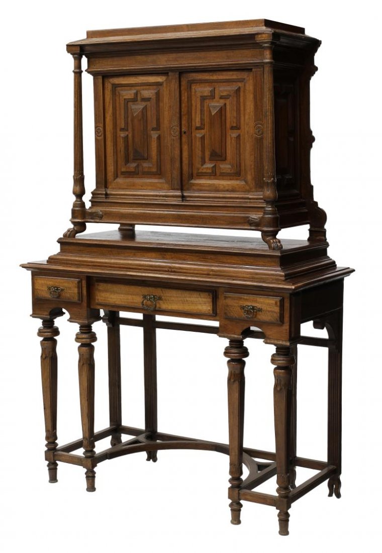 FRENCH 19TH C. CABINET ON STAND: French walnut finish cabinet on stand, 19th c., a stepped cornice over two door with flanking ribbed columns on claw feet, the integral stand with three frieze drawers, rising on stretcher joined squa