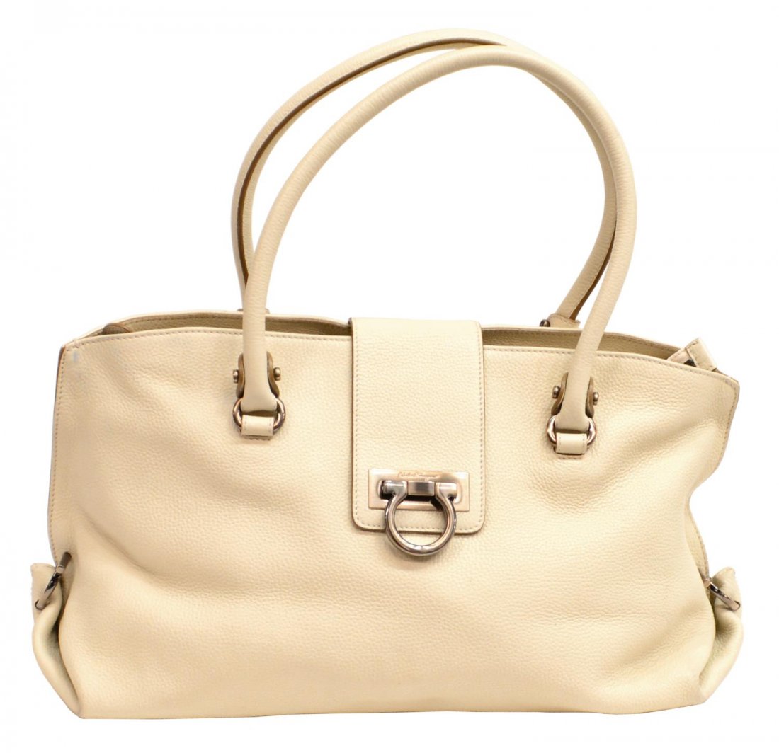 SALVATORE FERRAGAMO CREAM LEATHER SHOULDER BAG: Salvatore Ferragamo large shoulder bag in cream grained leather, fabric interior with side zipper closure and two open cell pockets, single zipper and flap with hardware closure, one exterior zipper p